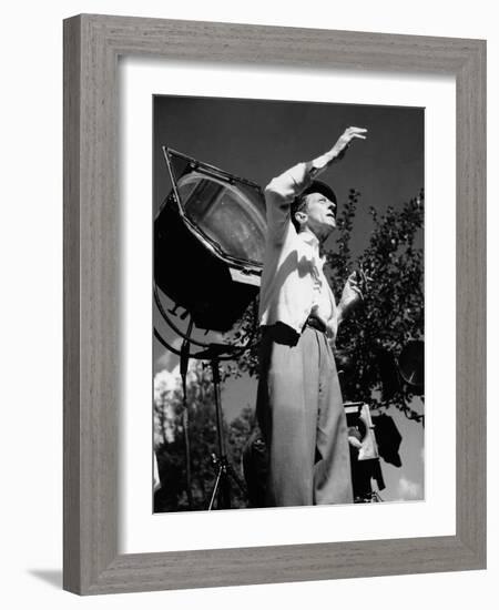 Jean Cocteau on the set of 'La Belle et La Bete', 1946 (b/w photo)-French Photographer-Framed Photo