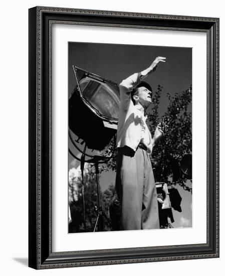 Jean Cocteau on the set of 'La Belle et La Bete', 1946 (b/w photo)-French Photographer-Framed Photo