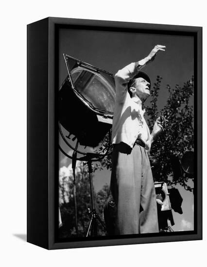 Jean Cocteau on the set of 'La Belle et La Bete', 1946 (b/w photo)-French Photographer-Framed Stretched Canvas