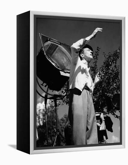 Jean Cocteau on the set of 'La Belle et La Bete', 1946 (b/w photo)-French Photographer-Framed Stretched Canvas