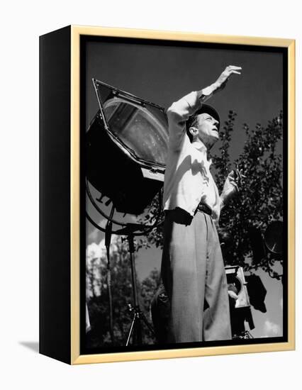 Jean Cocteau on the set of 'La Belle et La Bete', 1946 (b/w photo)-French Photographer-Framed Stretched Canvas