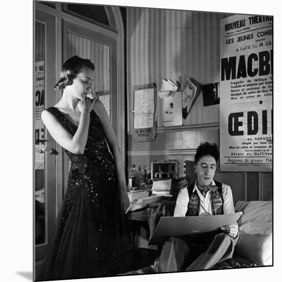 Jean Cocteau Sketching Model Elizabeth Gibbons in a Chanel Dress in His Hotel Bedroom-Roger Schall-Mounted Premium Photographic Print