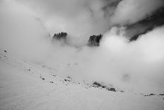 Clouds hang between the mountains of the Dolomites-Jean Schwarz-Premier Image Canvas