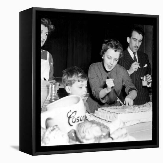 Jeanne Moreau Slicing a Cake-DR-Framed Premier Image Canvas