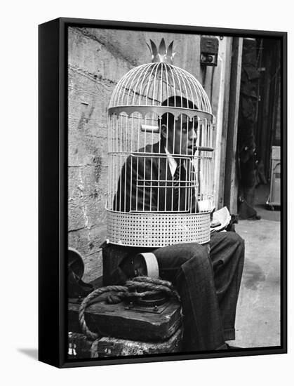 Jerry Lewis Clowning around by Wearing a Birdcage over His Head During Filming of "The Stooge"-Allan Grant-Framed Premier Image Canvas