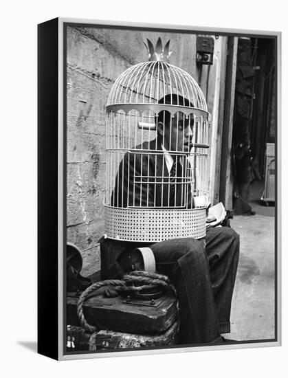 Jerry Lewis Clowning around by Wearing a Birdcage over His Head During Filming of "The Stooge"-Allan Grant-Framed Premier Image Canvas