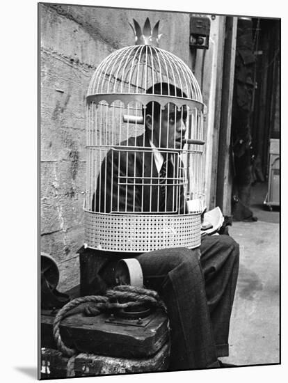 Jerry Lewis Clowning around by Wearing a Birdcage over His Head During Filming of "The Stooge"-Allan Grant-Mounted Premium Photographic Print