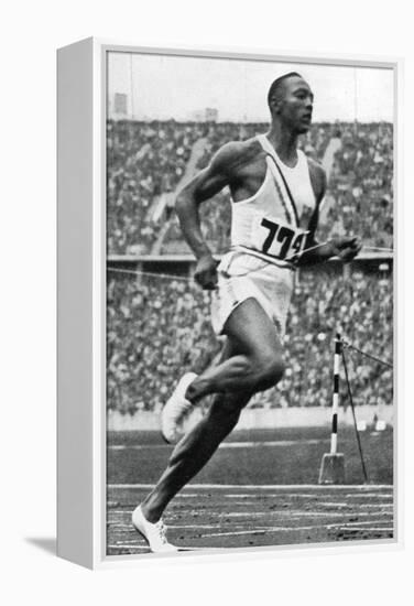 Jesse Owens at the End of the 100M at the Berlin Olympic Games, 1936-null-Framed Premier Image Canvas