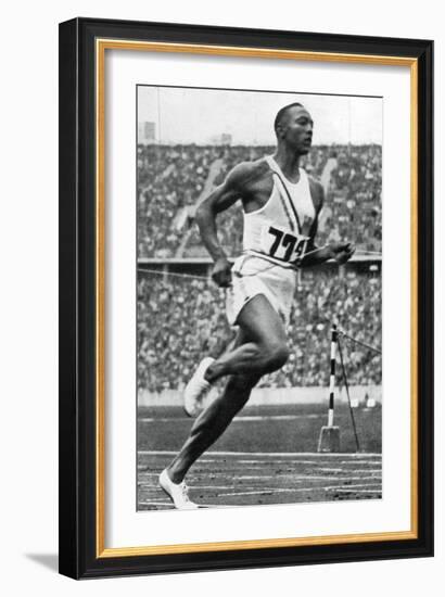 Jesse Owens at the End of the 100M at the Berlin Olympic Games, 1936-null-Framed Giclee Print