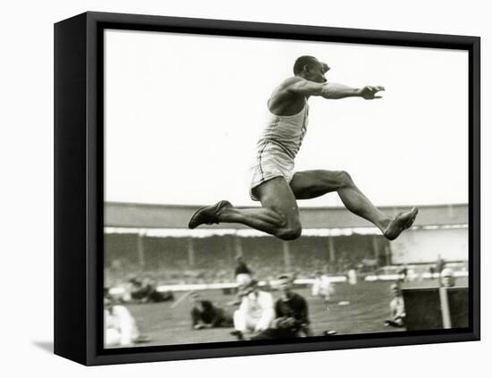 Jesse Owens in Action at the Long Jump During the Berlin Olympics, 1936-null-Framed Premier Image Canvas