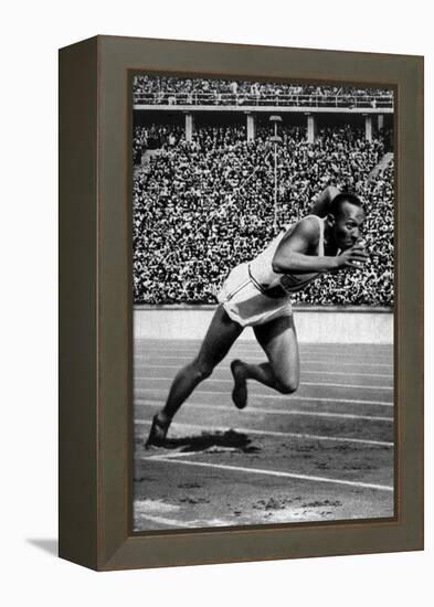 Jesse Owens Setting the 200 Meter Olympic Record at the Olympics in Berlin, Germany, 1936-null-Framed Stretched Canvas