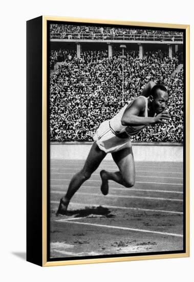 Jesse Owens Setting the 200 Meter Olympic Record at the Olympics in Berlin, Germany, 1936-null-Framed Stretched Canvas