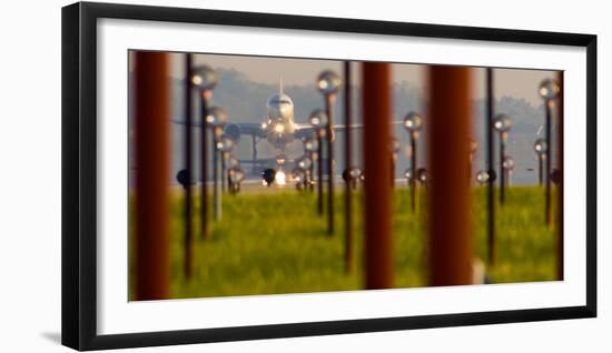 Jet airplane taking off from Detroit Metro Airport, Romulus, Michigan, USA-null-Framed Photographic Print