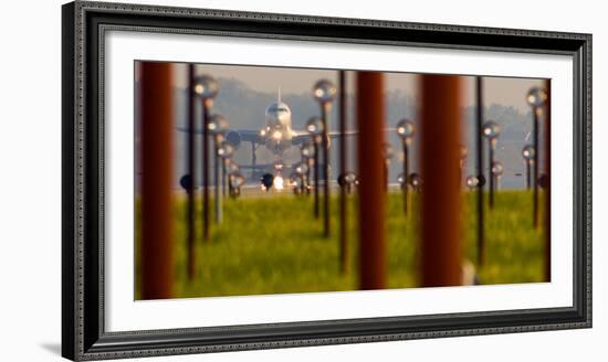 Jet airplane taking off from Detroit Metro Airport, Romulus, Michigan, USA-null-Framed Photographic Print