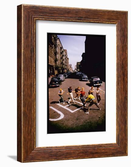 Jets' Dance on Busy Street in Scene from West Side Story-Gjon Mili-Framed Photographic Print