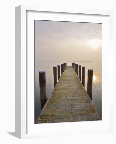 Jetty at sunrise with morning haze, Schweriner Innensee, Schwerin, Western Pomerania, Germany-Raimund Linke-Framed Photographic Print