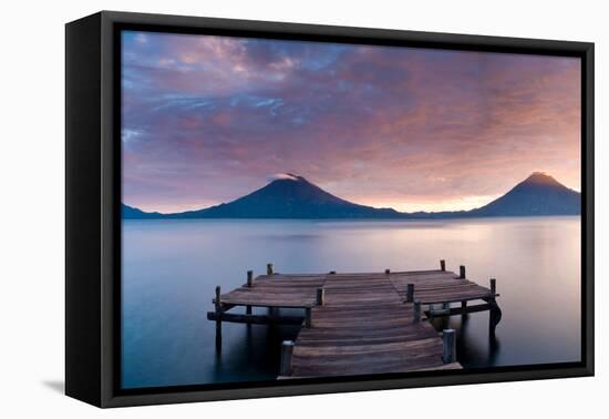 Jetty in a lake with a mountain range in the background, Lake Atitlan, Santa Cruz La Laguna, Wes...-null-Framed Premier Image Canvas