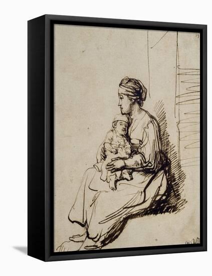 Jeune femme assise tenant son enfant sur ses genoux-Rembrandt van Rijn-Framed Premier Image Canvas