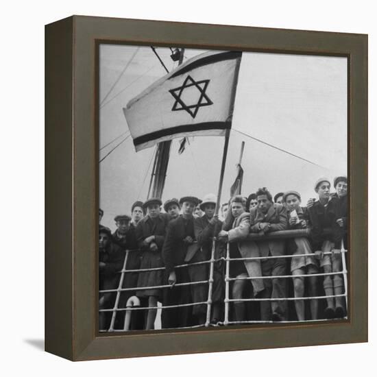 Jewish Immigrants, Arriving in Haifa Aboard Refugee Ship, Waving Future Flag of the State of Israel-Dmitri Kessel-Framed Premier Image Canvas