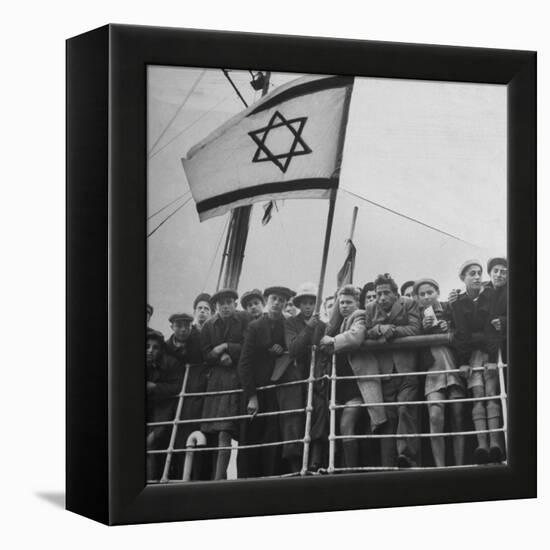 Jewish Immigrants, Arriving in Haifa Aboard Refugee Ship, Waving Future Flag of the State of Israel-Dmitri Kessel-Framed Premier Image Canvas