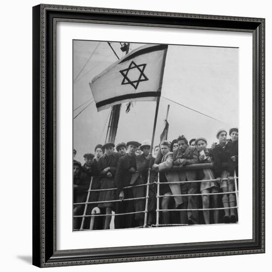 Jewish Immigrants, Arriving in Haifa Aboard Refugee Ship, Waving Future Flag of the State of Israel-Dmitri Kessel-Framed Photographic Print