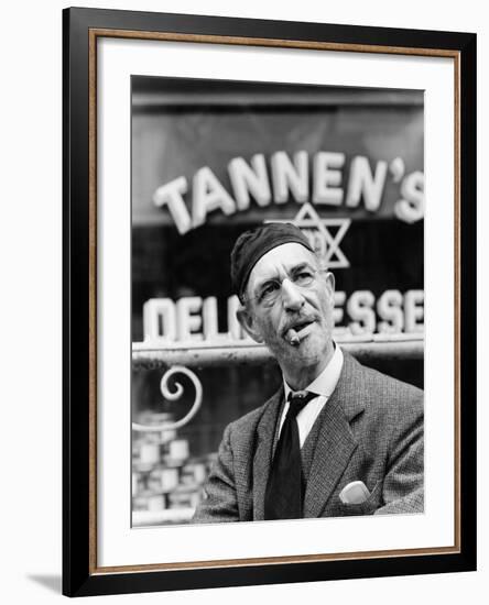 Jewish Man Standing in Front of a Storefront-null-Framed Photo