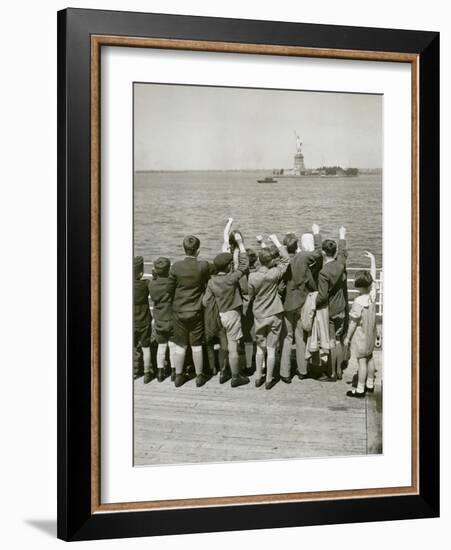Jewish Refugee Children Waving at the Statue of Liberty from Ocean Liner, 1939-null-Framed Photo