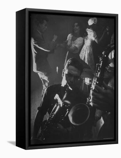 Jitterbugging at La Rose Rouge, with Saxophones Being Played in Foreground-Gjon Mili-Framed Premier Image Canvas