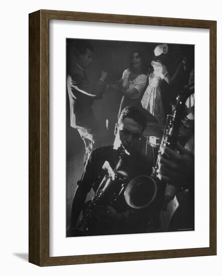 Jitterbugging at La Rose Rouge, with Saxophones Being Played in Foreground-Gjon Mili-Framed Photographic Print