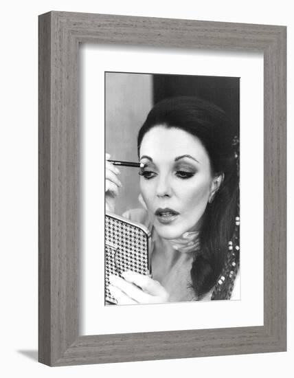 Joan Collins Applying Makeup-Associated Newspapers-Framed Photo