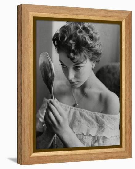 Joan Collins Studies Her Reflection-Associated Newspapers-Framed Stretched Canvas