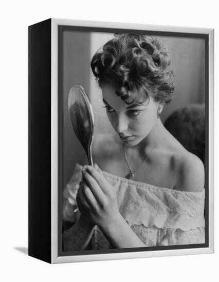 Joan Collins Studies Her Reflection-Associated Newspapers-Framed Stretched Canvas