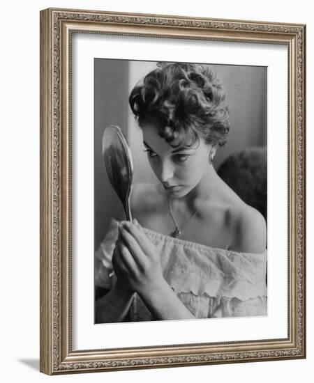 Joan Collins Studies Her Reflection-Associated Newspapers-Framed Photo