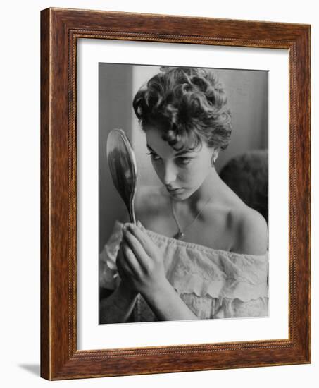 Joan Collins Studies Her Reflection-Associated Newspapers-Framed Photo