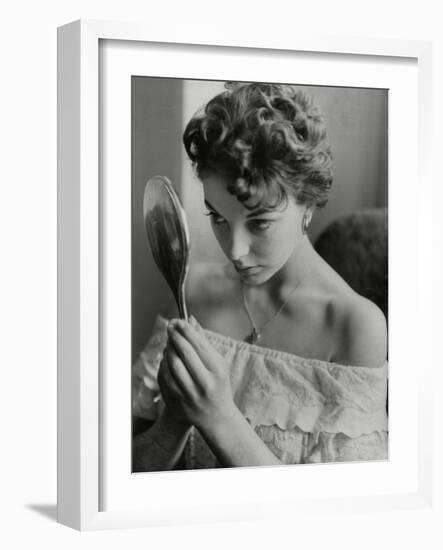 Joan Collins Studies Her Reflection-Associated Newspapers-Framed Photo