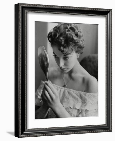 Joan Collins Studies Her Reflection-Associated Newspapers-Framed Photo