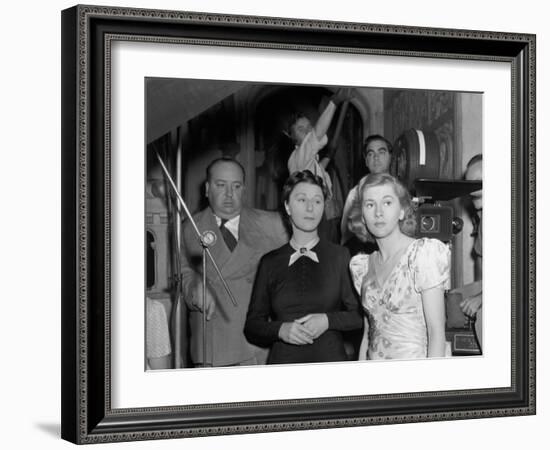 Joan Fontaine, Judith Anderson, Alfred Hitchcock, Rebecca, 1940-null-Framed Photographic Print