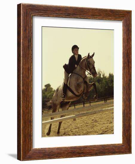 Jockey And a Horse Jumping Over a Hurdle-null-Framed Photographic Print