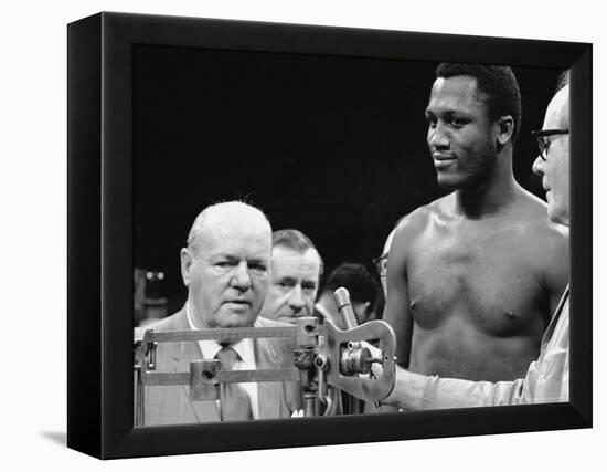 Joe Frazier at the Weigh in for His Fight Against Muhammad Ali-John Shearer-Framed Premier Image Canvas