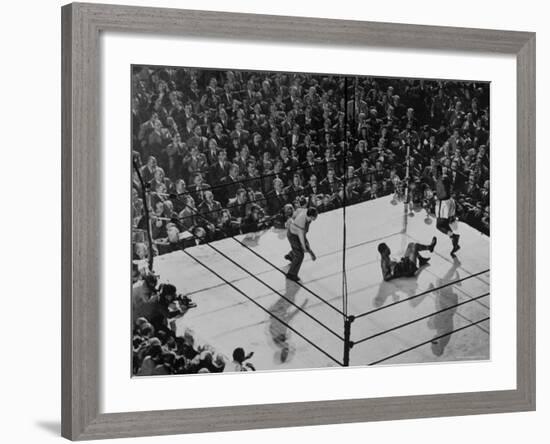 Joe Lewis on the Canvas After Being Knocked Down by Contender Jersey Joe Walcott-Gjon Mili-Framed Premium Photographic Print