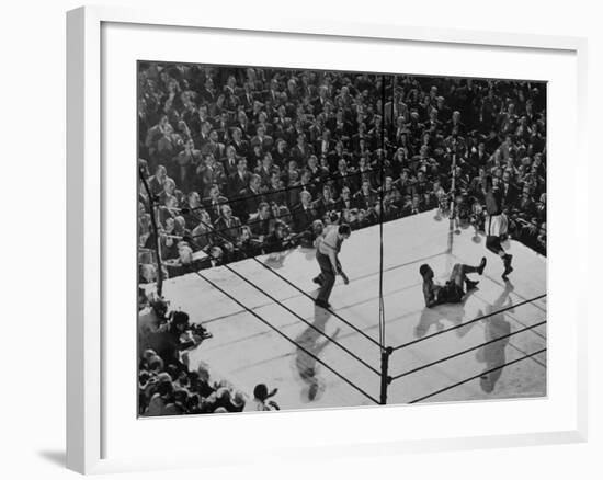 Joe Lewis on the Canvas After Being Knocked Down by Contender Jersey Joe Walcott-Gjon Mili-Framed Premium Photographic Print
