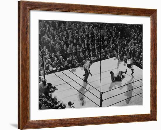 Joe Lewis on the Canvas After Being Knocked Down by Contender Jersey Joe Walcott-Gjon Mili-Framed Premium Photographic Print