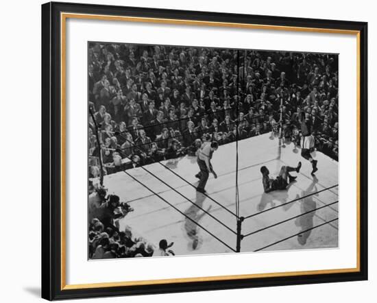 Joe Lewis on the Canvas After Being Knocked Down by Contender Jersey Joe Walcott-Gjon Mili-Framed Premium Photographic Print