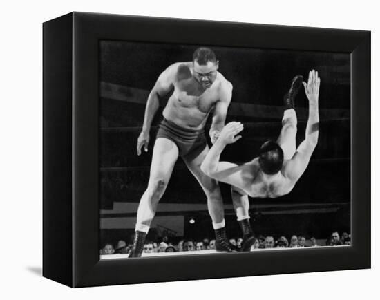 Joe Louis Throws Jim Bernard to the Mat During a 1956 Wrestling Match in Detroit-null-Framed Stretched Canvas