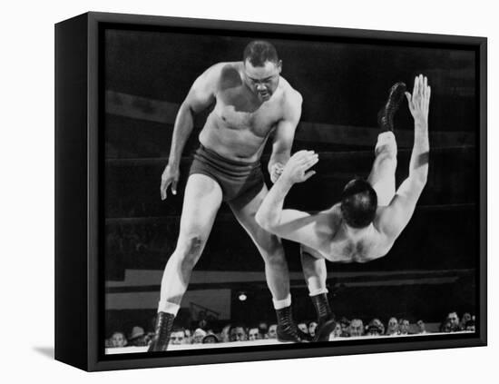 Joe Louis Throws Jim Bernard to the Mat During a 1956 Wrestling Match in Detroit-null-Framed Stretched Canvas