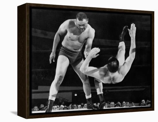 Joe Louis Throws Jim Bernard to the Mat During a 1956 Wrestling Match in Detroit-null-Framed Stretched Canvas