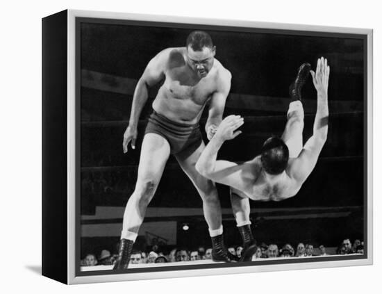 Joe Louis Throws Jim Bernard to the Mat During a 1956 Wrestling Match in Detroit-null-Framed Stretched Canvas