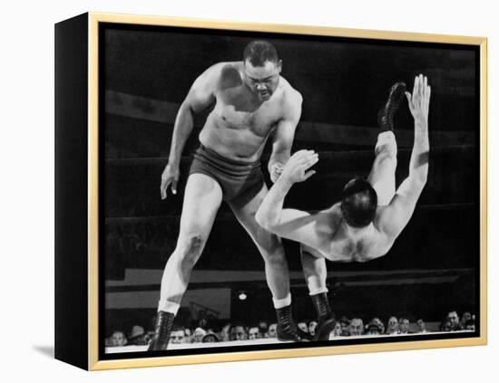 Joe Louis Throws Jim Bernard to the Mat During a 1956 Wrestling Match in Detroit-null-Framed Stretched Canvas