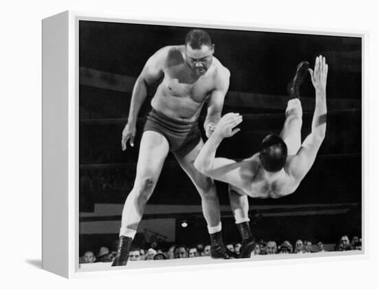 Joe Louis Throws Jim Bernard to the Mat During a 1956 Wrestling Match in Detroit-null-Framed Stretched Canvas