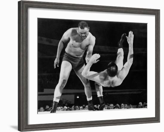 Joe Louis Throws Jim Bernard to the Mat During a 1956 Wrestling Match in Detroit-null-Framed Photo